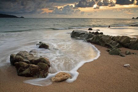 Seascape with soft motion wave at Kalim beach in Phuket Thailandの写真素材