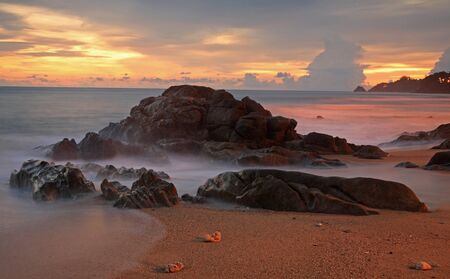 Seascape of Kalim beach at twilight sky in Phuket, Thailandの写真素材