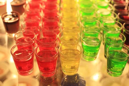 Colorful fruit jelly dessert in transparent glassの写真素材