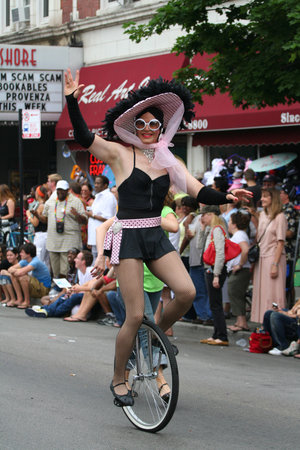 CHICAGO, IL, US - JUNE 25, 2007: Unidentified Gay riding Unicycle to join Chicago Gay Pride Parade Celebration at Broadway street.のeditorial素材
