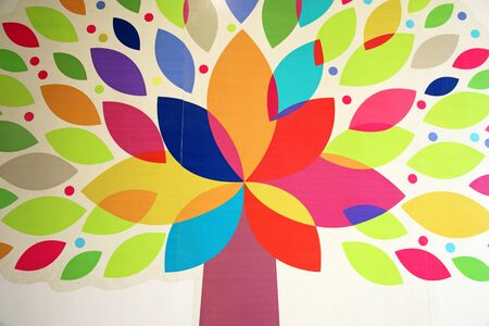 Colorful leaves and tree on the wallの写真素材