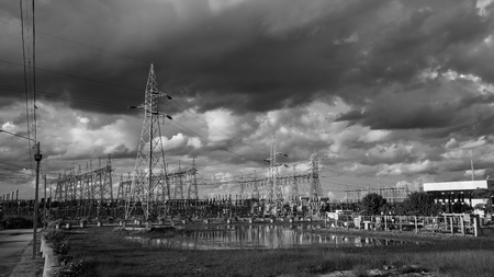 Electric power substation against dramatic sky and cloud, Black and whiteの写真素材