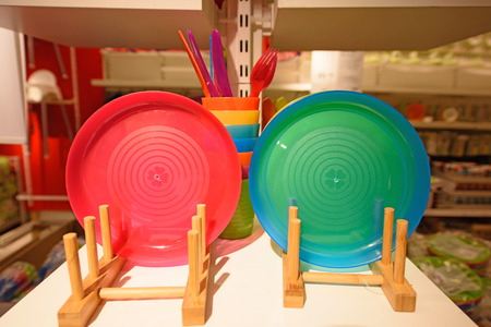 Colorful Children plastic tableware for sale in storeの写真素材