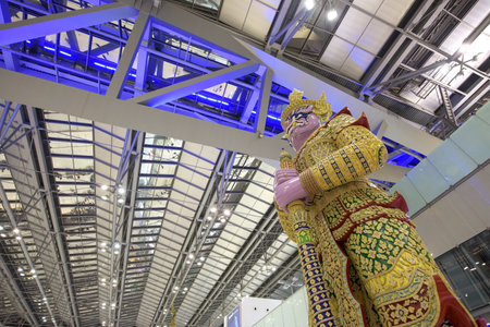 BANGKOK, THAILAND - NOVEMBER 07, 2015: Giant God statue at Suvarnabhumi Airport interior. Here is one of two international airports in Bangkok.のeditorial素材