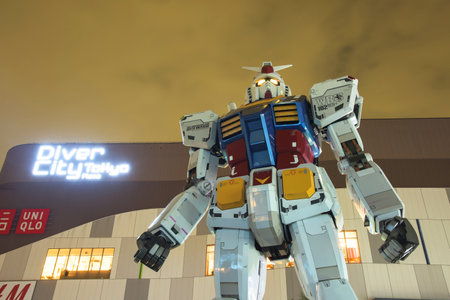 TOKYO, JAPAN - NOVEMBER 07, 2015: Statue of Gundam at twilight sky in DivercCity Tokyo Plaza. Tokyo is both the capital and largest city of Japan.のeditorial素材