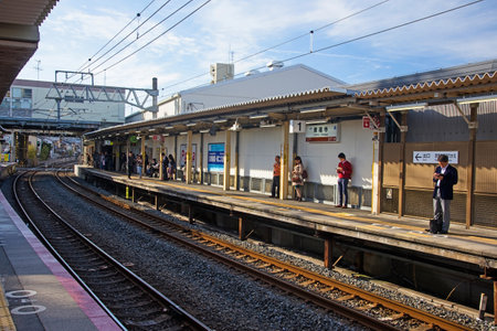 KYOTO, JAPAN - NOVEMBER 11, 2015: Unidentified people at Tofukuji JR station. Here is very popular station to access to Tofukuji temple.のeditorial素材