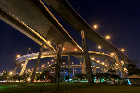 Bhumibol Bridge at dawn in Bangkok, Thailand. Foreign text on the bridge is the bridge name "Bhumibol 1"の写真素材