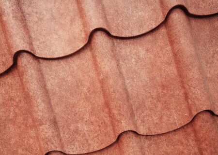 Grunge brown sheet metal roof for textured backgroundの写真素材