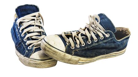 Old dirty sneakers isolated on white background, Lifestyle of teenagerの写真素材