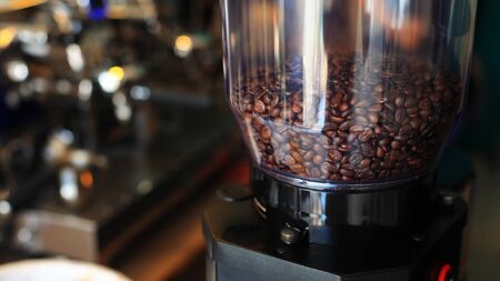 Coffee beans in coffee machine, Business Lifestyleの写真素材