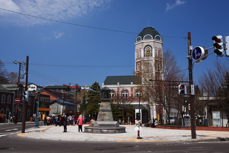 OTARU, HOKKAIDO, JAPAN - APRIL 21, 2016: Antique monument and buildings at Sakaimachi Street. Here is the preserved merchant street of Otaru.のeditorial素材