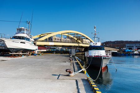 OTARU, HOKKAIDO, JAPAN - APRIL 21, 2016: harbor at Otaru city. Otaru, small city near Sapporo, is famous on historic canal and warehouse district.のeditorial素材