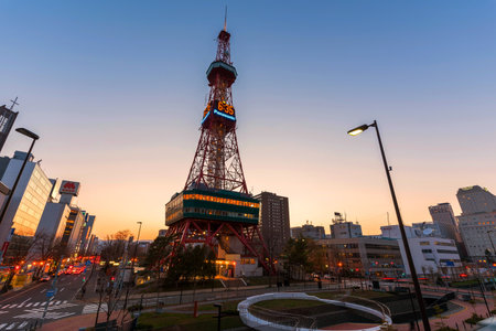 SAPPORO, JAPAN - APRIL 24, 2016: Sapporo TV Tower at sunset near Odori Park. The 147.2 meter high tower has an observation deck open to tourists.のeditorial素材