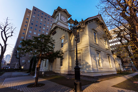 SAPPORO, HOKKAIDO, JAPAN - APRIL 24, 2016: Sapporo Clock Tower, in evening. Here, found in 1878, is famous local tourist attraction in Sapporo city.のeditorial素材