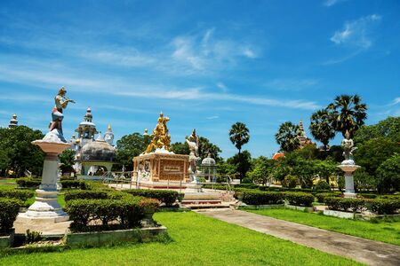 Gold sithata buddha monument at Wat Phai Rong Wua, Suphanburi, Thailand. Foreign language on monument means 'Sithata' in Thai language.の写真素材