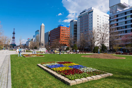 SAPPORO, HOKKAIDO, JAPAN - APRIL 24, 2016: Unidentified people enjoy spring time at Odori park in front of Sapporo TV tower.のeditorial素材