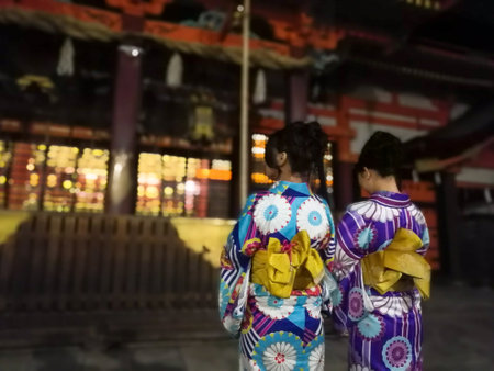 Japanese Kimono girls pray at Yasaka shrine, Kyotoのeditorial素材