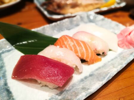 Fresh Sushi set in Japanese restaurant at Dotonburi, Osaka, Japanの写真素材