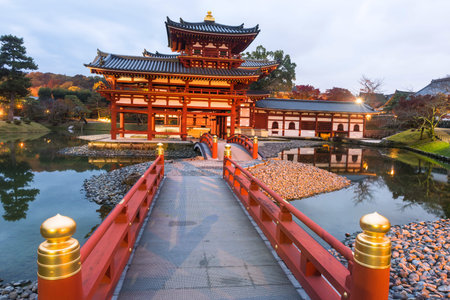 Byodo-in's Phoenix hall at dusk in Uji, Kyoto, Japan. here is the most famous Uji landmark jointly...