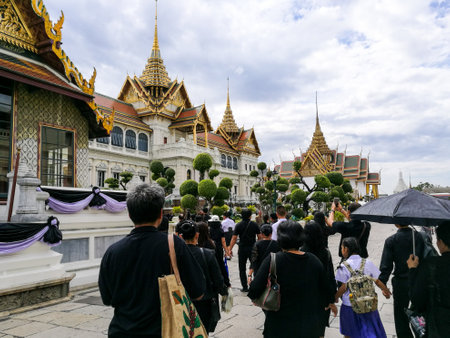 BANGKOK, THAILAND - JANUARY 02, 2017: Unidentified mourn Thai people at Royal Grand Palace to make condolence to the King Bhumibol's coffin in the Grand Palace.のeditorial素材