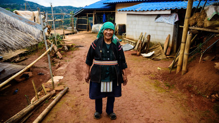 CHIANG RAI, THAILAND - JANUARY 05, 2017: Unidentified Akha smile tribe woman at her village in Mae Salong hill.のeditorial素材