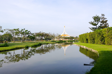 Suanluang RAMA IX park public townhall with skyline reflection, Bangkok, Thailandの写真素材