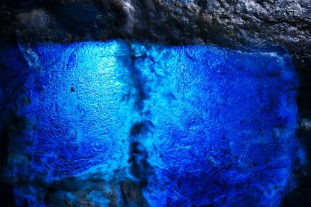 Textured background of fake blue ice rock tunnelの写真素材