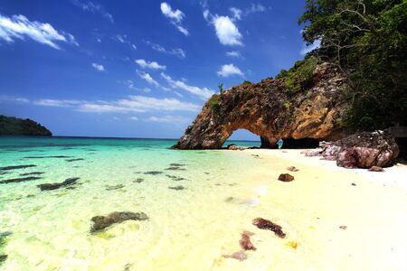 Ko Khai nature stone arch near Lipe, Satun, Thailandの写真素材
