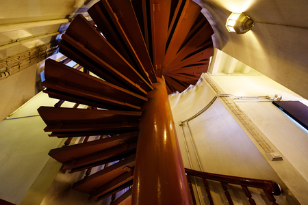 Wooden spiral staircase with handrail, Antique Architecture interiorの写真素材