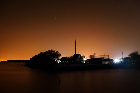 Silhouette Thai church with motion stars before sunrise, Samuth Sakhon, Thailandの写真素材