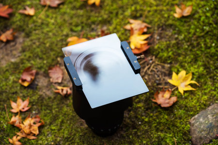 Lense with Graduated Neutral Density (GND) filter and holder for autumn season photo