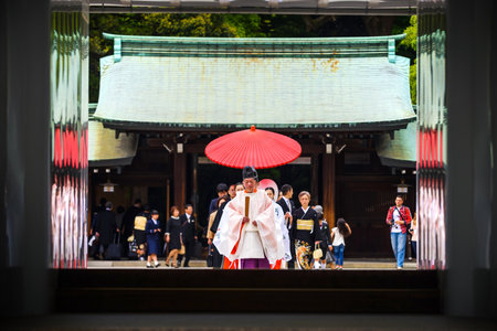 TOKYO, JAPAN - MAY 7, 2017: Unidentified Japanese poeple perform celebration of a typical Shinto wedding at Meiji Jingu Shrine.のeditorial素材