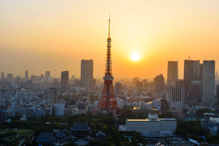 TOKYO, JAPAN - MAY 8, 2017: Tokyo tower at sunset from World Trade Center building view. World Trade observatory is famous to see cityscape with Tokyo tower.のeditorial素材