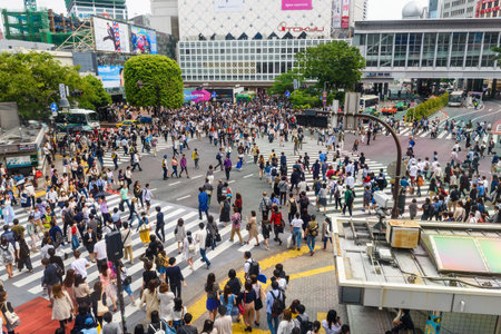 TOKYO, JAPAN - MAY 7, 2017: Many Pedestrians at Shibuya crossing. Here is very famous of scramble crosswalk in the world.