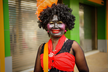 NAKHON RATCHASIMA, THAILAND - JULY 9, 2017: Unidentified woman with funny costume join candle carving festival parade in Korat town.のeditorial素材