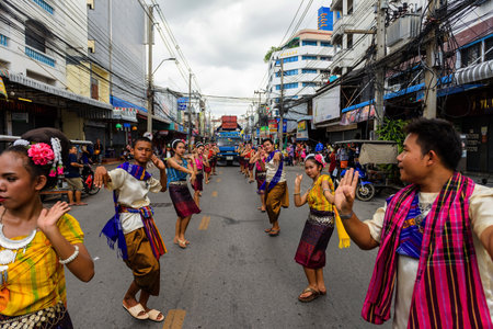 NAKHON RATCHASIMA, THAILAND - JULY 9, 2017: Unidentified Thai people perform traditional dance at Candle festival parade at Korat town. Big candle used in temple during raining season.のeditorial素材