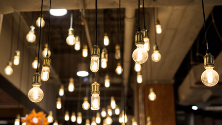 Many light bulbs for interior decoration. Warm yellow colorの写真素材