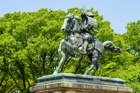 TOKYO, JAPAN - MAY 8, 2017: Statue of the great samurai Kusunoki Masashige isolated on white...