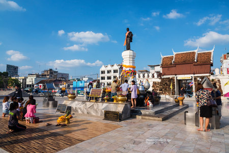 KORAT, THAILAND - MAY 14, 2016: Unidentified people pray respect to Thao Suranaree statue. Suranaree, also called Ya Mo, protects city against Lao army.のeditorial素材
