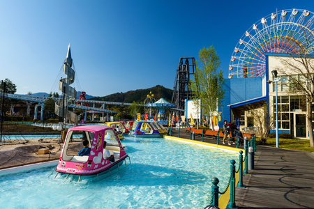 YAMANASHI, JAPAN - MAY 01, 2017: Unidentified people riding watercycle at Fuji-Q Highland amusement parkのeditorial素材