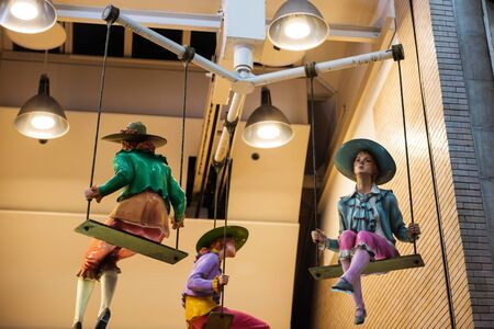 Hanging beautiful girl model dolls decorated at retail shopping mall, Fashion conceptの写真素材