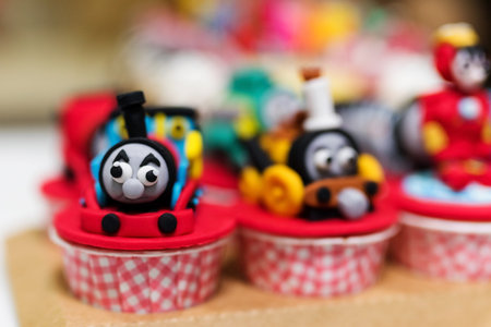 Beautiful handmade cupcake with famous Thomas train model for kid birthday celebration