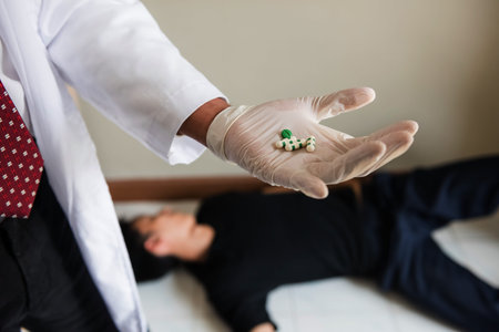 Doctor hands carrying many evidence pills during performing autopsy or postmortem of death young man...
