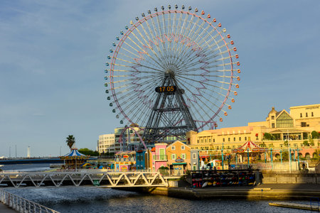 YOKOHAMA, JAPAN - MAY 6, 2017: Yokohama cityscape with Ferris wheel in Minato Mirai waterfront district before sunset. Here is the most famous landmark in Yokohama.のeditorial素材