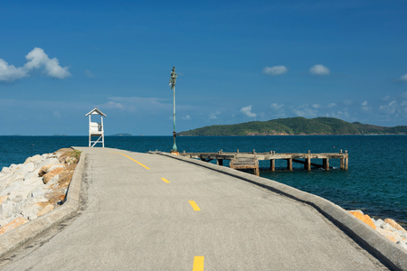 Lighthouse with Seascape blue ocean and clear sky at Khao Laem Ya in Mu Ko Samet National Park, Rayong Province, Thailand.の写真素材