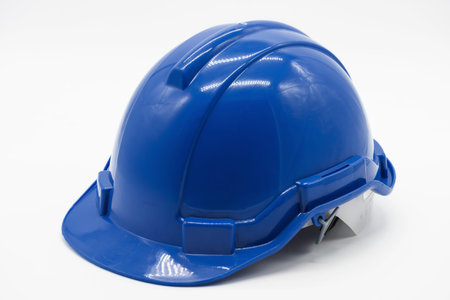 blue safety engineer helmet on white background with copy space for text.