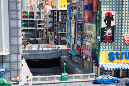 Nagoya, Japan - April 08, 2019: Lego art model of Dotonbori canal with Glico in Osaka decorated at Japan Legoland. Famous theme park landmark espcially for children age around 1 to 7 years old.のeditorial素材