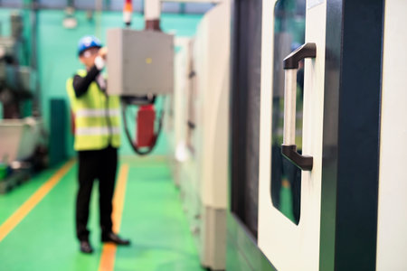 High Technology machine with supervisor doing quality control (QC) and production check in factory...