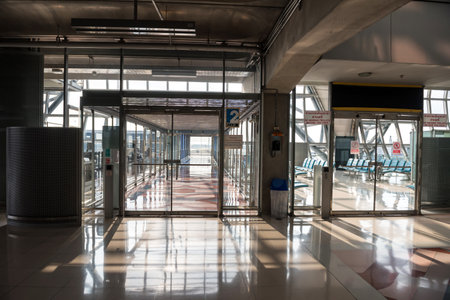Bangkok, Thailand - March 21, 2020: Suvarnabhum international Airport gate terminal without people due to covid-19 or Corona Virus pandemic disease.Stay home, wfh, social distancing, quarantine.のeditorial素材