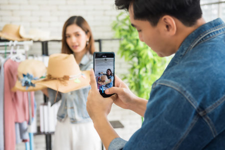 Record video streaming online by smartphone of beauty blogger or Stylist popular influencer girl...
